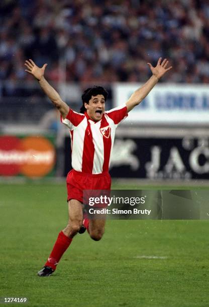 Darko Pancev of Red Star Belgrade celebrates after scoring the winning penalty during the European Cup final against Marseille in Bari, Italy. Red...