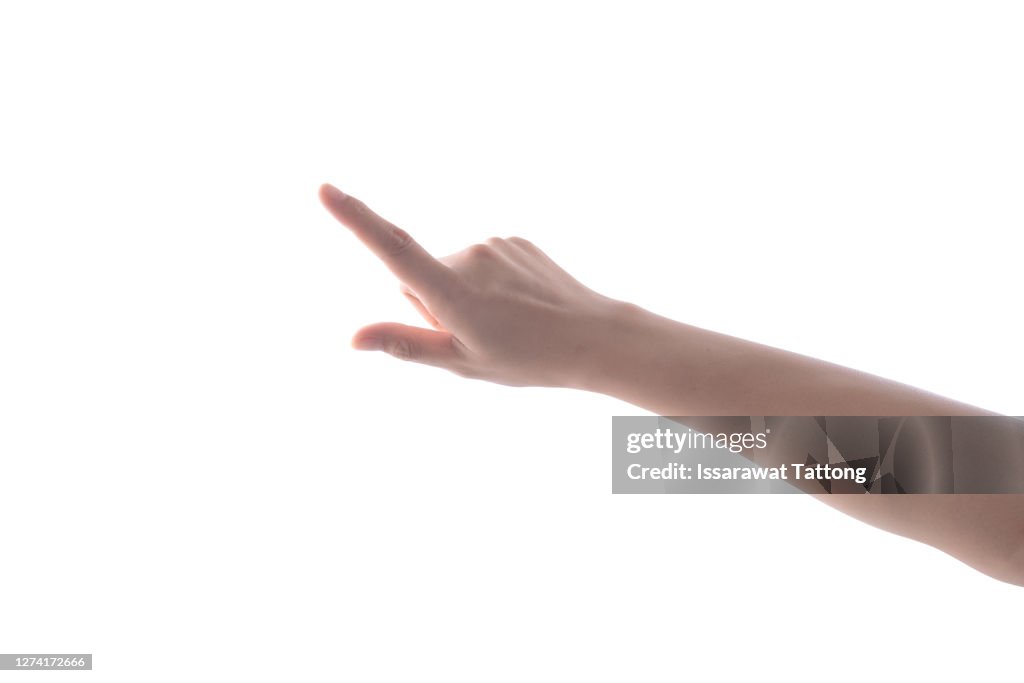 Female's hand touching or pointing to something isolated on white background. Close up. High resolution.