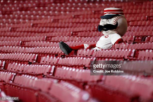 Cincinnati Reds mascot Mr. Redlegs watches the game from the stands in the seventh inning against the Milwaukee Brewers at Great American Ball Park...