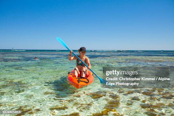 womankayakinginlongreachbay, perth, western australia, australia - rottnest island stock pictures, royalty-free photos & images