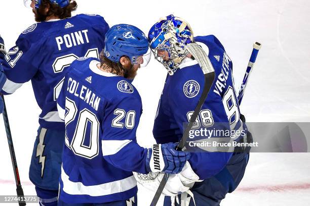 Blake Coleman and Andrei Vasilevskiy of the Tampa Bay Lightning celebrate the teams 3-2 victory against the Dallas Stars in Game Two of the 2020 NHL...