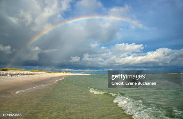 rainbow over beach, gulf islands national seashore, florida, usa - pensacola beach fotografías e imágenes de stock