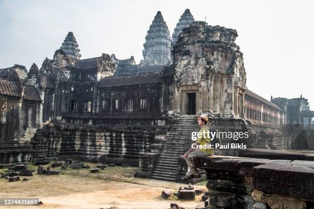 tourist insideangkorwattemple complex, siemreap, cambodia - angkor wat stock pictures, royalty-free photos & images