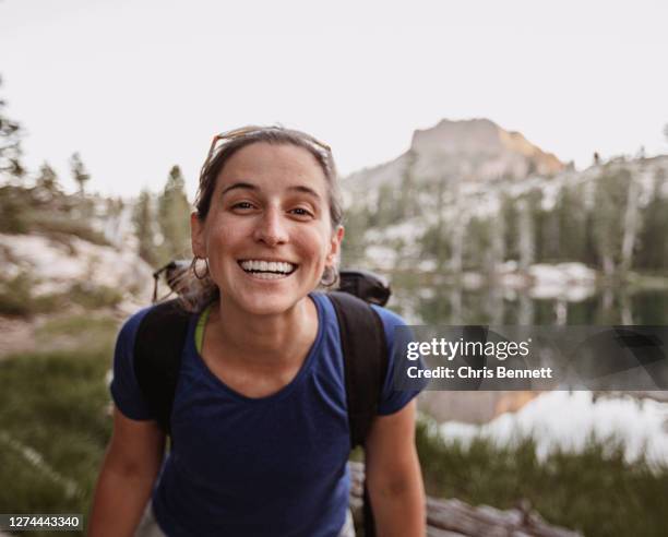hiker smiling at camera, truckee, california, usa - long - fotografias e filmes do acervo