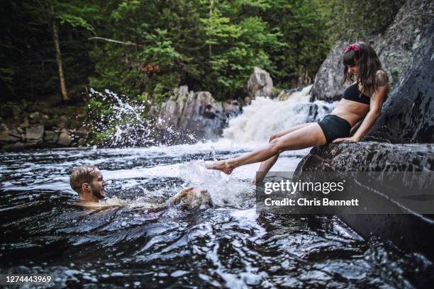 couple playing in water - appalachian trail fotografías e imágenes de stock