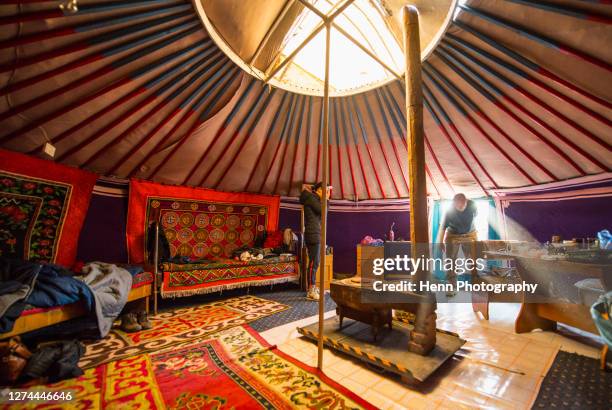 interior of traditional yurt, olgiy, bayan-olgiy, mongolia - rundzelt stock-fotos und bilder