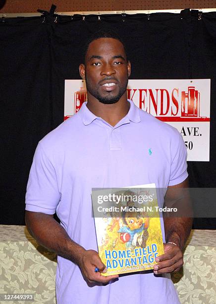 Justin Tuck promotes "Home Field Advantage" at Bookends on September 27, 2011 in Ridgewood, New Jersey.