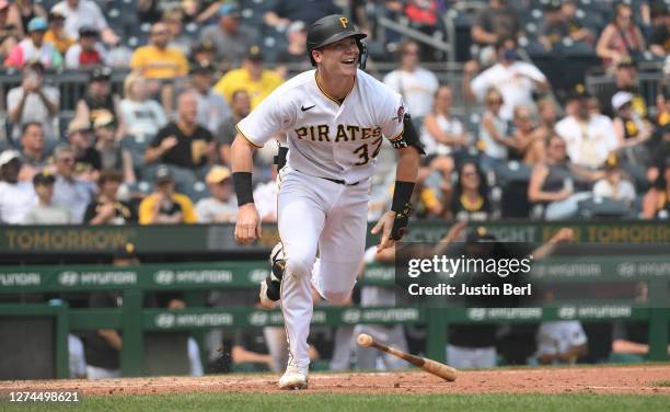 Henry Davis of the Pittsburgh Pirates hits an RBI single in the seventh inning during the game against the San Diego Padres at PNC Park on June 29,...