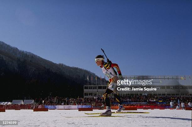 Martina Zellner of Germany helps her team win the gold medal in the womens 4x7.5 relay in the biathlon at Nozawa-Onsen during the 1998 Olympic Winter...