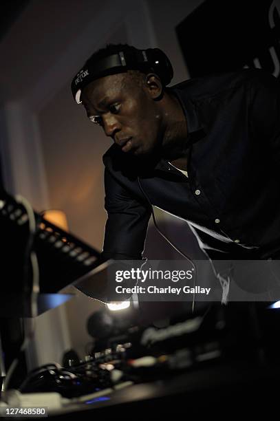 Olympic gold medalist Usain Bolt deejays at the Hublot Beverly Hills Boutique opening party at Mr. C Hotel on September 27, 2011 in Los Angeles,...