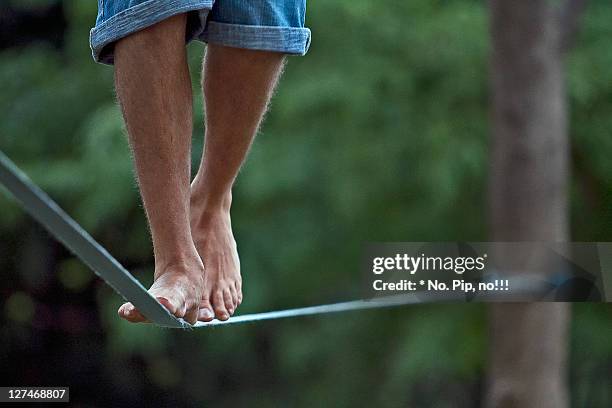 tightrope walker - tightrope walking stock-fotos und bilder