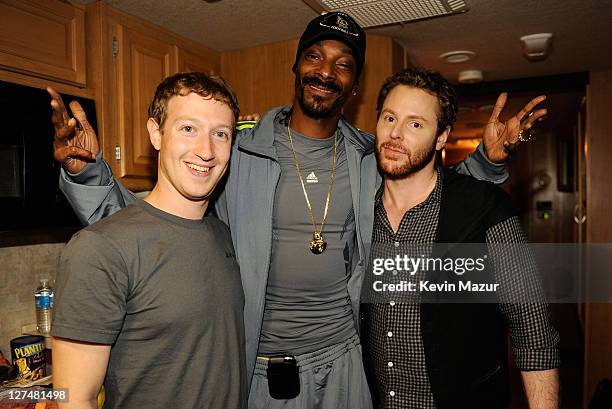 Facebook founder Mark Zuckerberg, rapper Snoop Dogg, and entrepreneur Sean Parker pose backstage at Sean Parker's Celebration of Music on September...