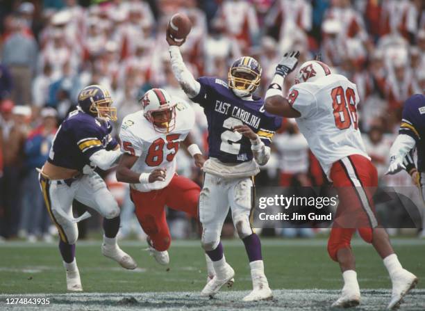 Jeff Blake, Quarterback for the East Carolina Pirates throws the ball downfield during the 1991 NCAA Division I-A Peach Bowl college football game...