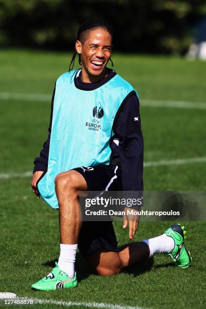 Steven Pienaar laughs during the Tottenham Hotspur Training session held at Spurs Lodge training ground on September 28, 2011 in London, England.