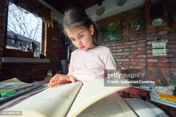 homeschooling in a poverty conditions. - coronavirus romania stock pictures, royalty-free photos & images