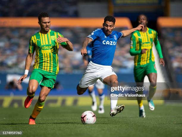 Allan of Everton and Kieran Gibbs of West Bromwich Albion in action during the Premier League match between Everton and West Bromwich Albion at...