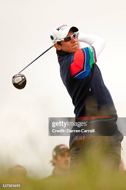 Matteo Manassero of Italy plays a shot during a practice round at the 2011 Open Championship at Royal St. George's Golf Club in Sandwich, England on...