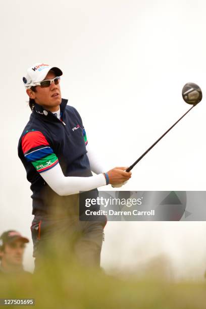 Matteo Manassero of Italy plays a shot during a practice round at the 2011 Open Championship at Royal St. George's Golf Club in Sandwich, England on...