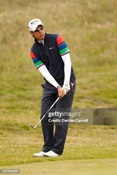 Matteo Manassero of Italy plays a shot during a practice round at the 2011 Open Championship at Royal St. George's Golf Club in Sandwich, England on...