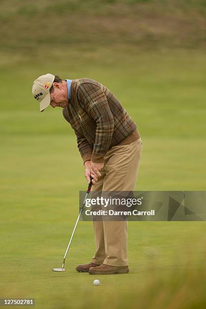 Tom Watson plays a shot during the first round of the 2011 Open Championship at Royal St. George's Golf Club in Sandwich, England on July 14, 2011.