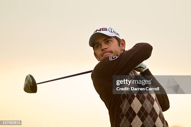 Louis Oostuizen of South Africa plays a shot during the first round of the 2011 Open Championship at Royal St. George's Golf Club in Sandwich,...