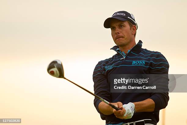 Henrik Stenson of Sweden plays a shot during the first round of the 2011 Open Championship at Royal St. George's Golf Club in Sandwich, England on...