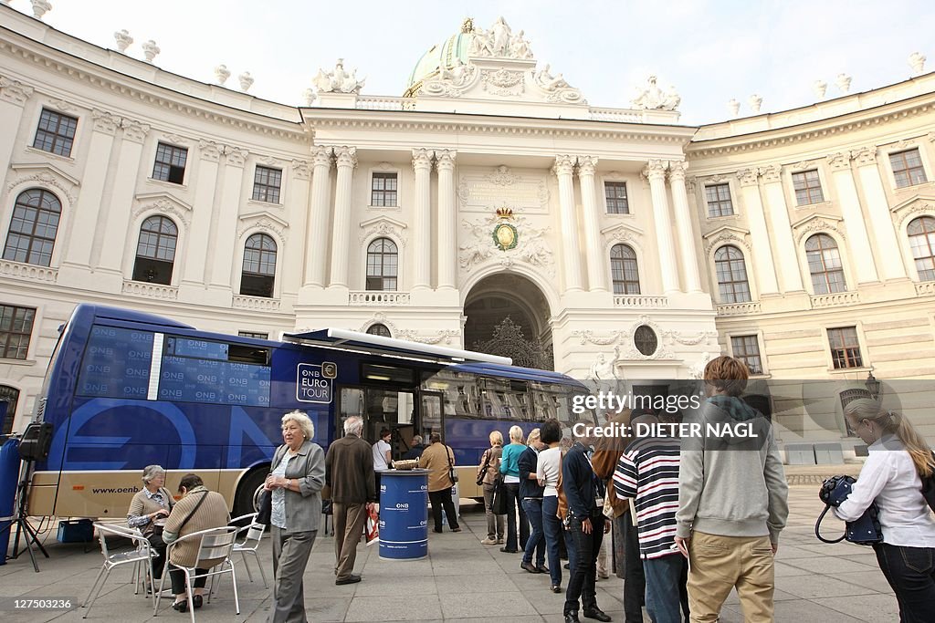 People line up to exchange Austrian Schi
