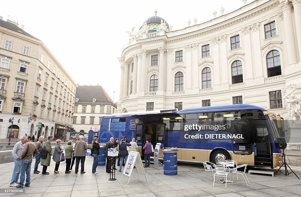 People line up to exchange Austrian Schi