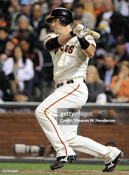 Eli Whiteside of the San Francisco bats against the Colorado Rockies during an MLB baseball game at AT&T Park on September 26, 2011 in San Francisco,...