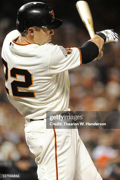 Eli Whiteside of the San Francisco Giants bats against the Colorado Rockies during an MLB baseball game at AT&T Park on September 27, 2011 in San...