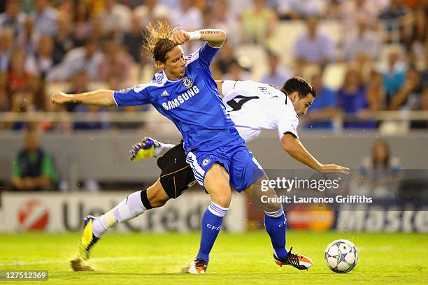 Fernando Torres of Chelsea and Adil Rami of Valencia battle for the ball during the UEFA Champions League Group E match between Valencia CF and...