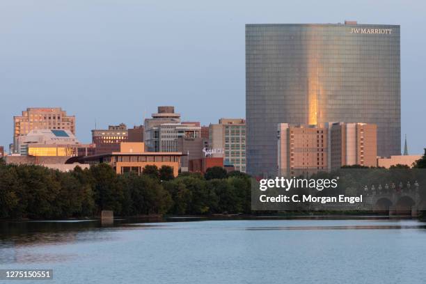 The NCAA National Office and NCAA Hall of Champions sits on the White River in front of the silhouetted Indianapolis skyline on September 21, 2020 in...