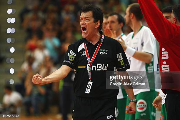 Head coach Velimir Petkovic of Goeppingen celebrates during the Toyota Handball Bundesliga match between Frisch Auf Goeppingen and Fuechse Berlin at...