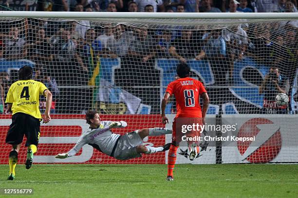 Lucho González of Olympique Marseille scores by penalty against Roman Weidenfeller of Dortmund during the UEFA Champions League group F match between...