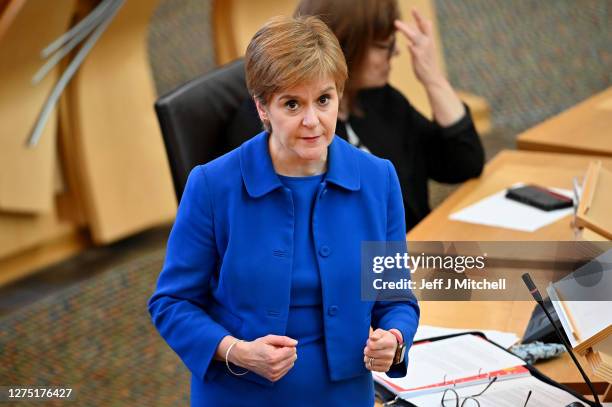 First Minister Nicola Sturgeon announces her plans to halt the spread of coronavirus at the Scottish Parliament on September 22, 2020 in Edinburgh,...