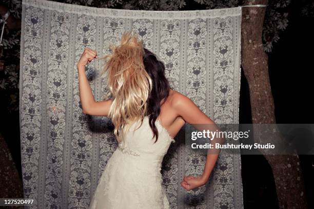 bride in crazy wig posing - naughty bride fotografías e imágenes de stock