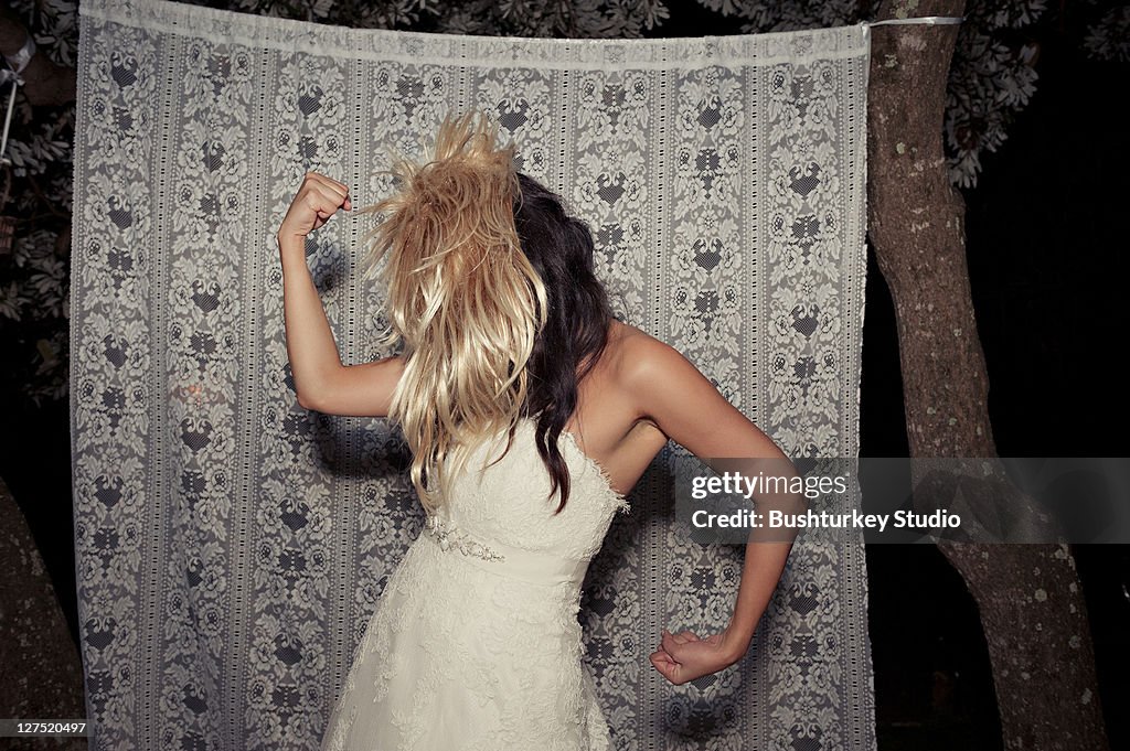 Bride in crazy wig posing