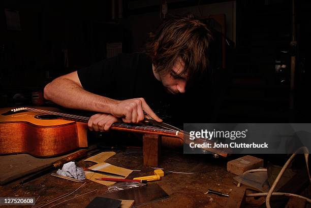 man making a guitar - make music day stock pictures, royalty-free photos & images