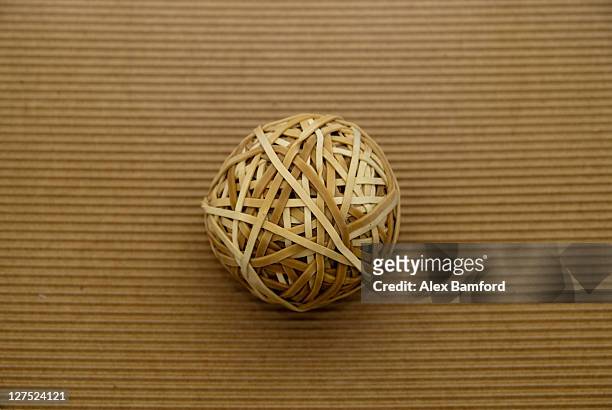 stationery ball - elastic band ball stock pictures, royalty-free photos & images