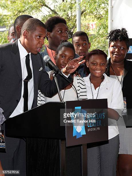 Brooklyn Nets co-owner Shawn Carter brings onstage high school students at George Westinghouse Career and Technical Education High School, his alma...