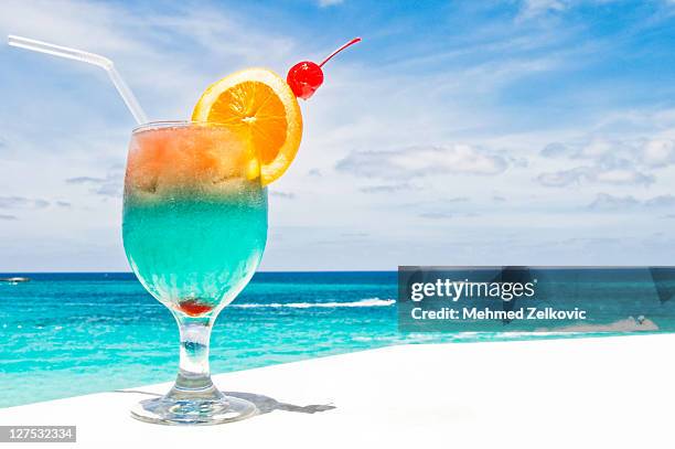 tropical drink on paradise vacation - nassau beach stock pictures, royalty-free photos & images