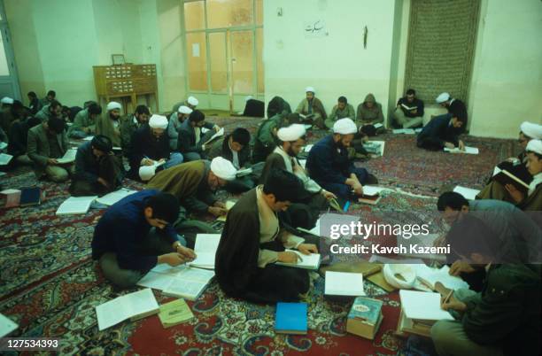 Theology students study Qoranic texts in a classroom at Feyzieh seminary in Qom, Iran, 1st February 1986. Qom is a major centre of Shi'ite Islam.