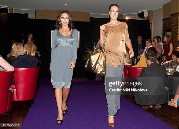 Funda Onal walks the runway during Catwalk @ Kings Road at beaufort house on September 28, 2011 in London, England.