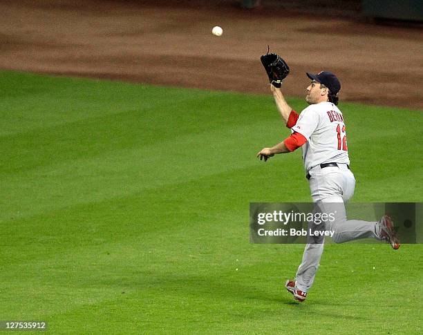 Right fielder Lance Berkman of the St. Louis Cardinals runs down a fly ball against the Houston Astros at Minute Maid Park on September 28, 2011 in...