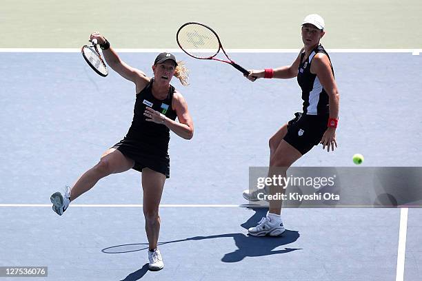Lisa Raymond and Liezel Huber of the United States play in their doubles match against Chan Yung-Jan of Chinese Taipei and Julia Goerges of Germany...