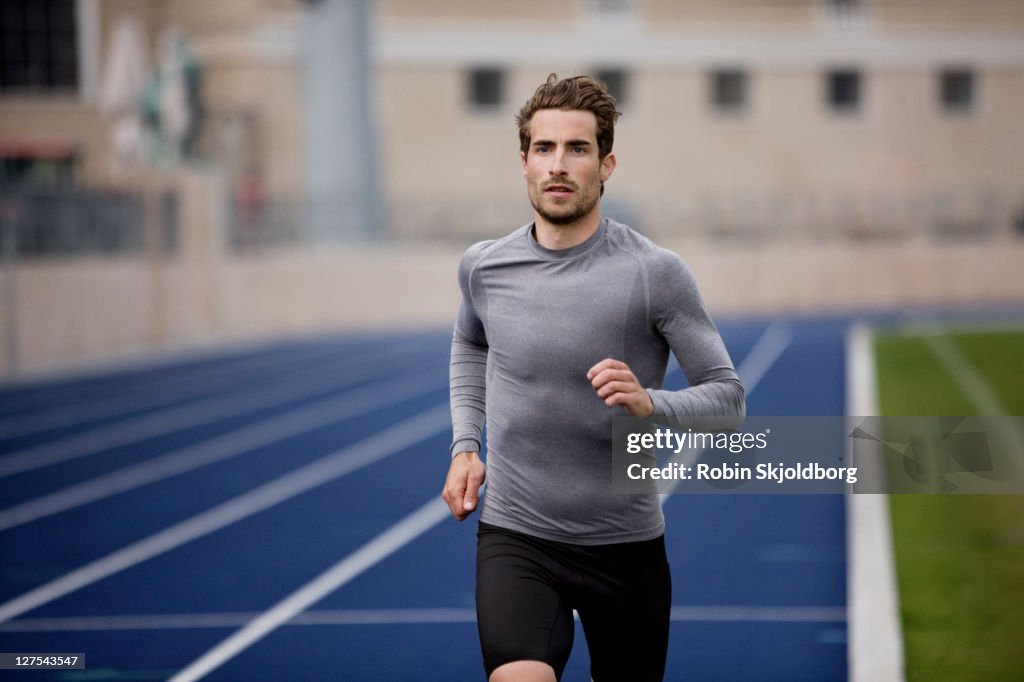Man running on track