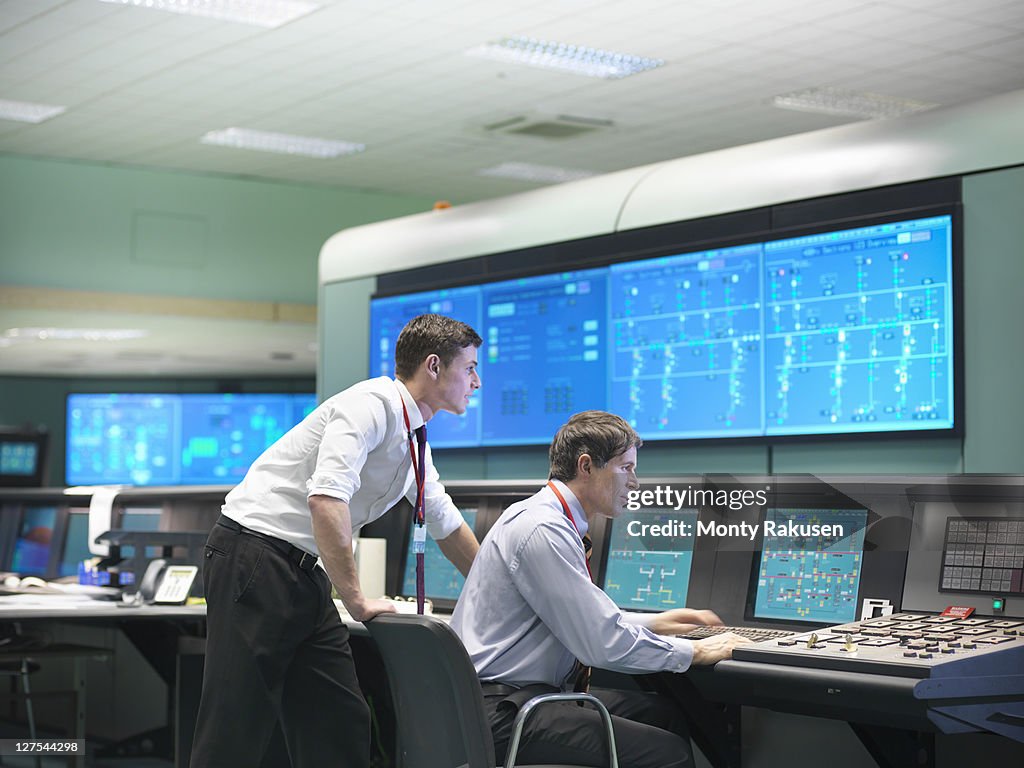 Operators in power station control room