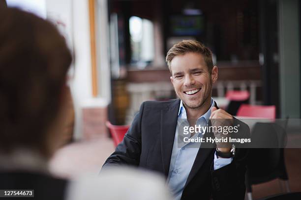 businessman laughing at lunch - working lunch stock pictures, royalty-free photos & images