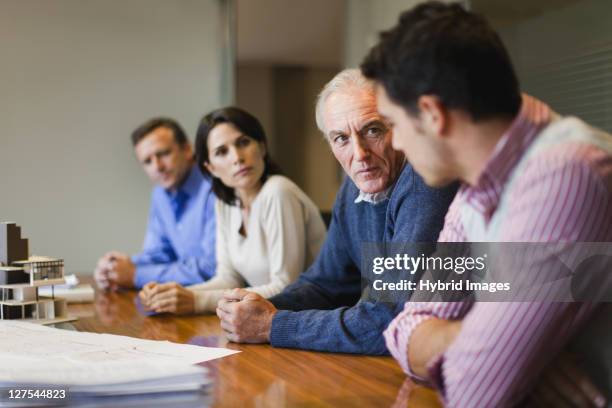 serious business people in meeting - conflict stock pictures, royalty-free photos & images