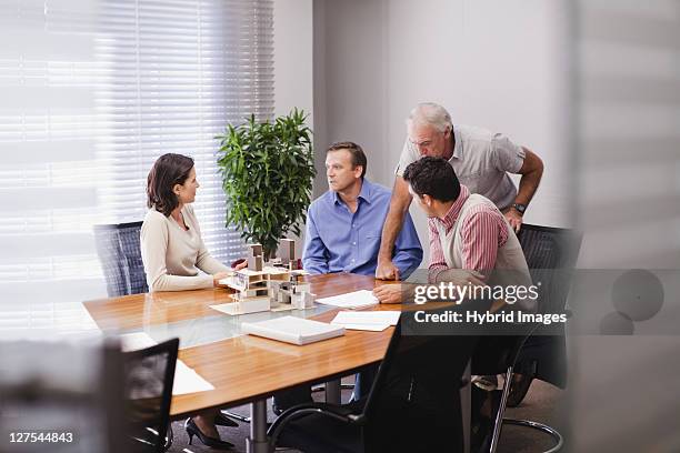 business people in meeting - chairperson stock pictures, royalty-free photos & images